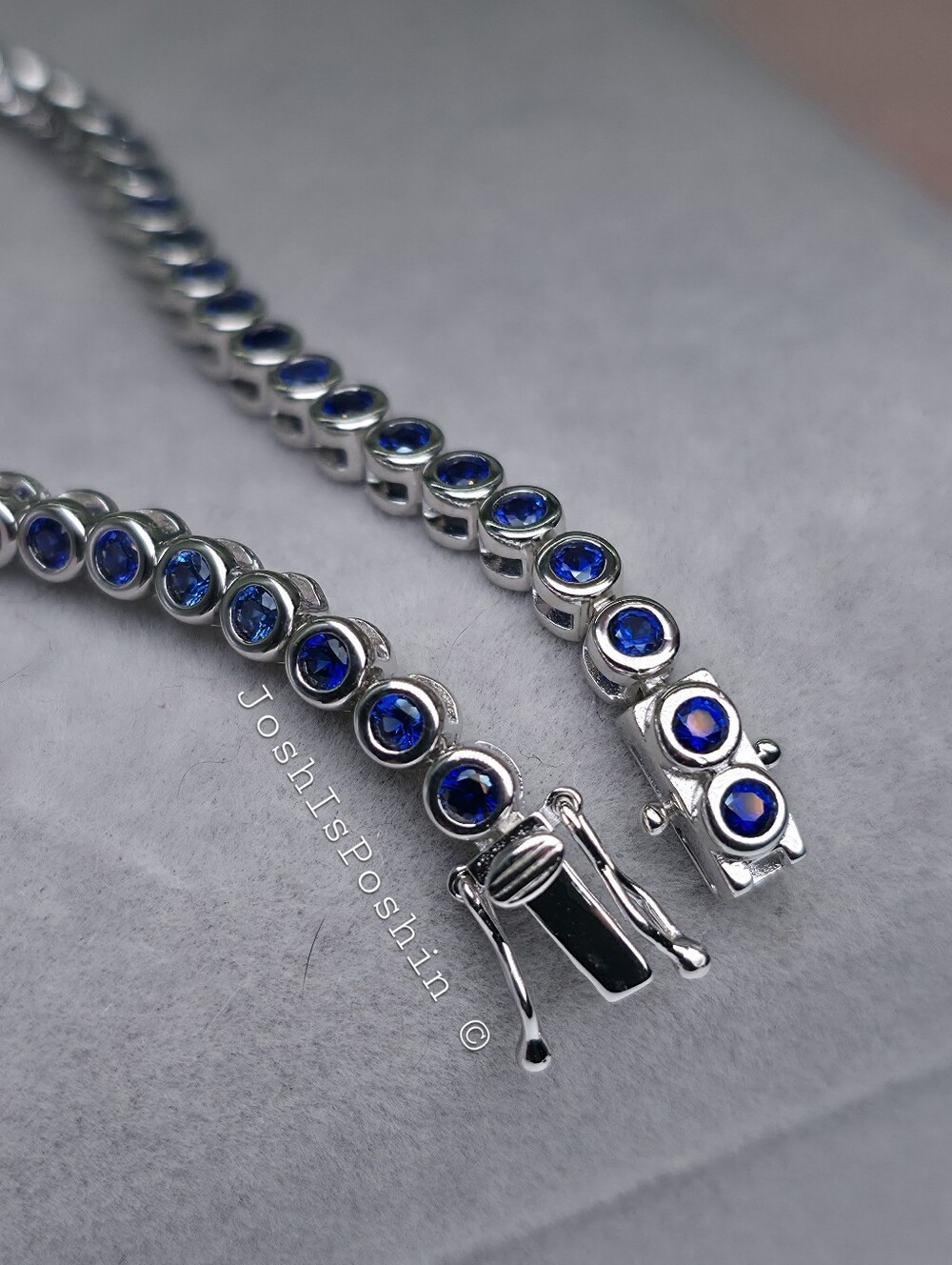 2MM Blue Sapphire 2.12ctw bezel set tennis bracelet In sterling silver